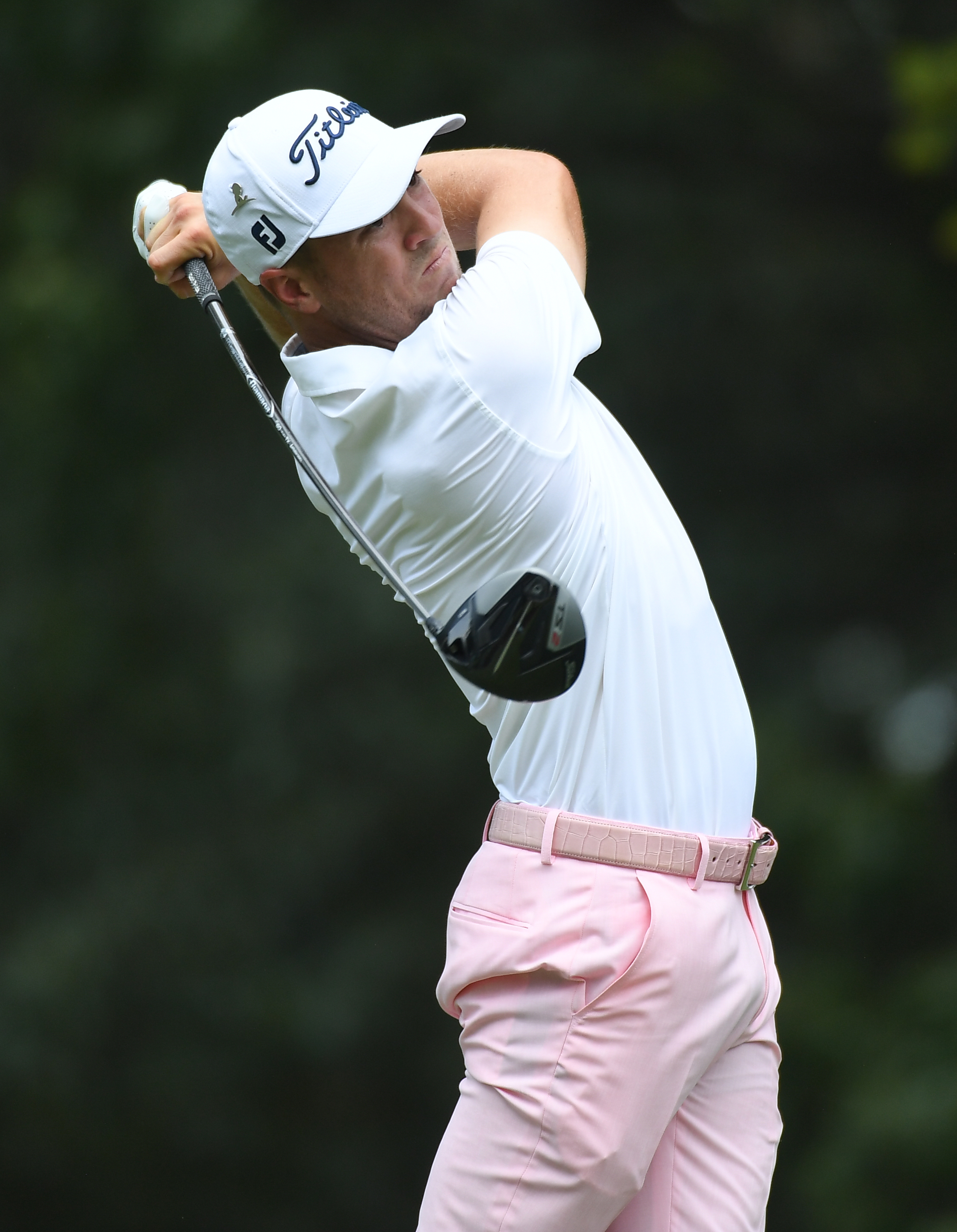 Justin Thomas in pink belt