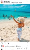 Jena Sims wearing celebratory floppy hat
